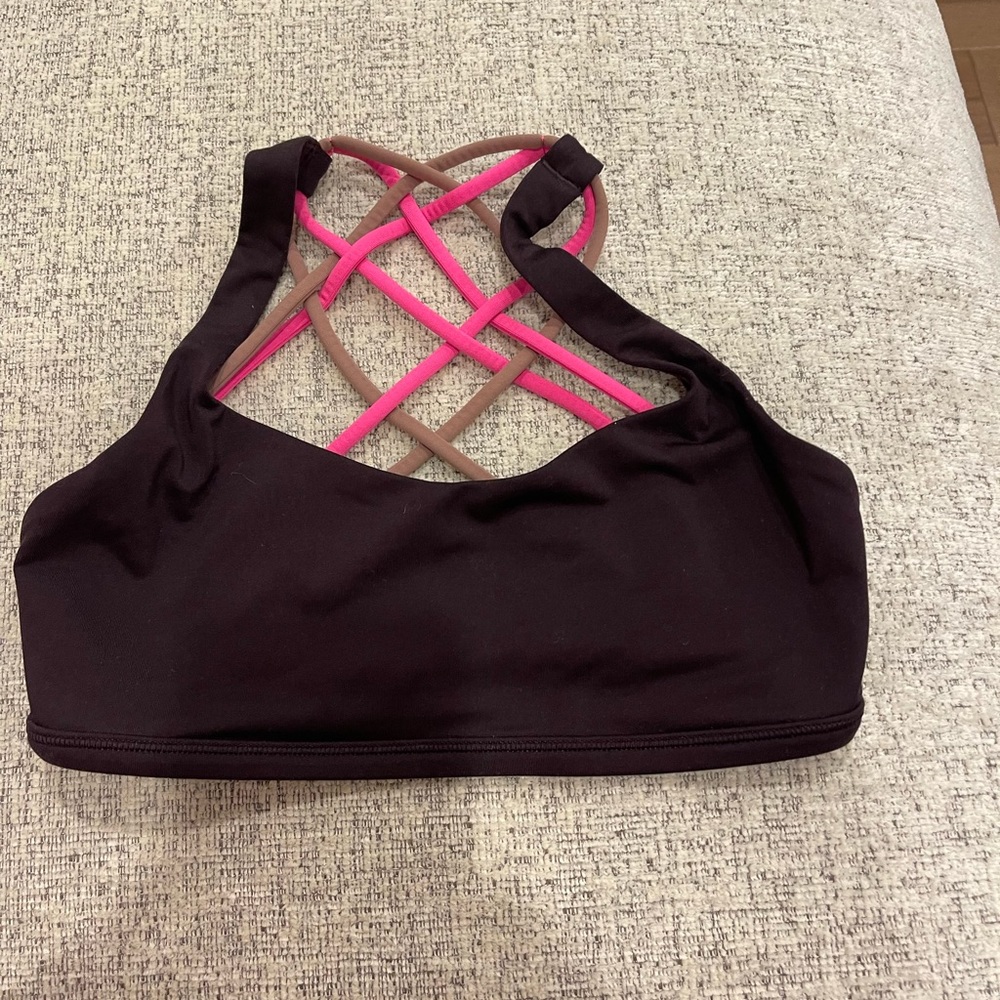 Lululemon sports bra. Burgundy with hot pink and maybe straps. Size 4